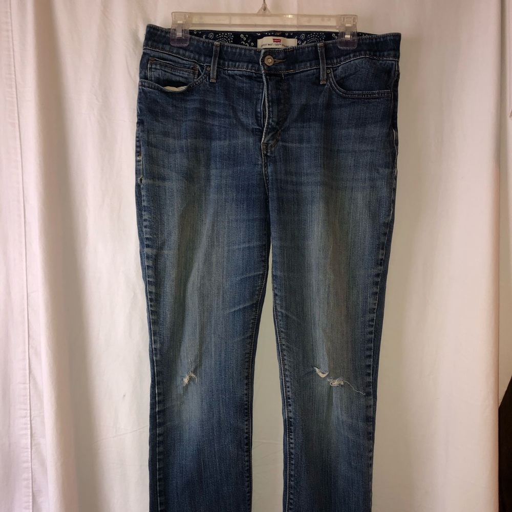 Distressed Levi's size 12